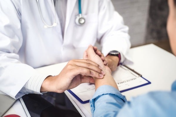 doctor checking health primary of male patient for consultation in picture id1140150522